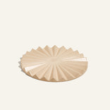 beige pleat trivet